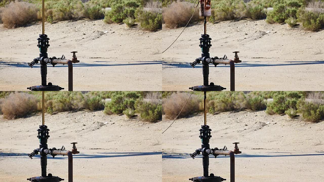 加利福尼亚沙漠中的移动油泵光杆特写