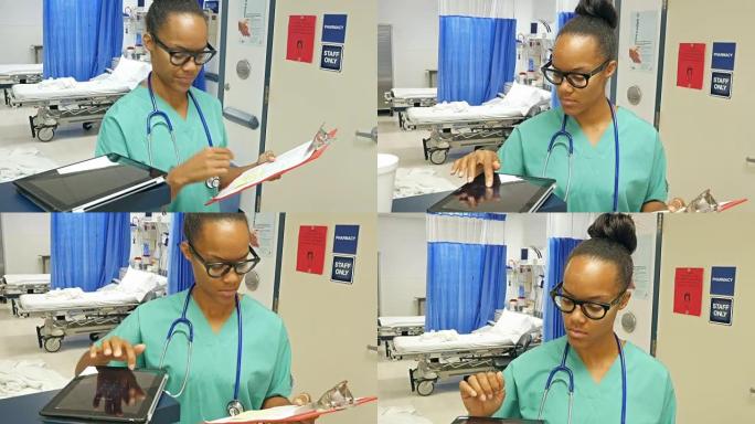 年轻的非洲裔美国护士正在使用数字平板电脑为她的下一个病人做准备