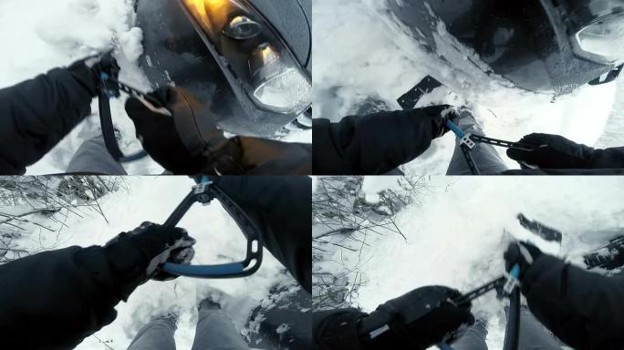 POV男子用铲子从雪中挖车