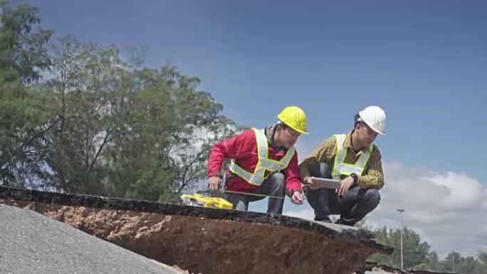 4K DOLLY: 工人和工程师检查