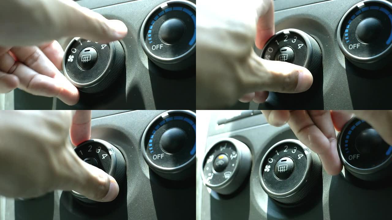 镜头打开汽车空调调试旋钮