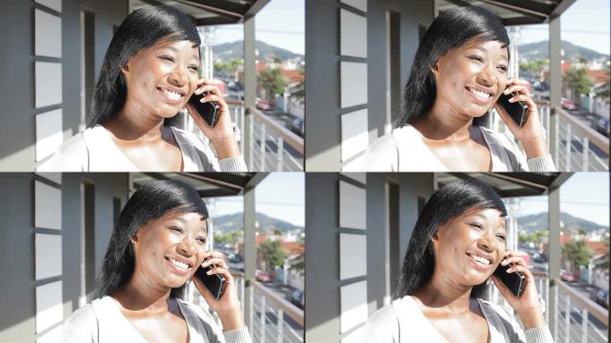 微笑的非洲商界女性在手机上