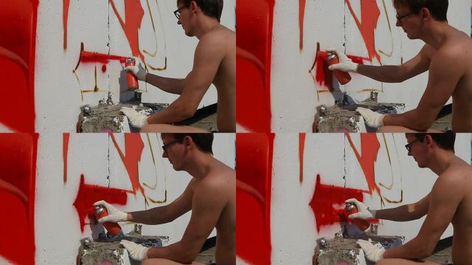 涂鸦艺术家在墙上喷漆（高清）