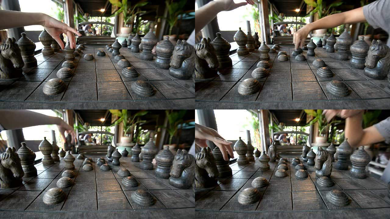 下棋的男子和女子排在棋盘上