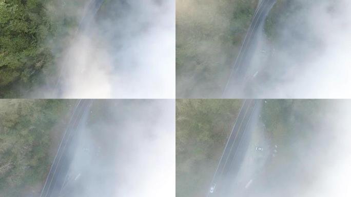 穿过雾直飞到下面的道路