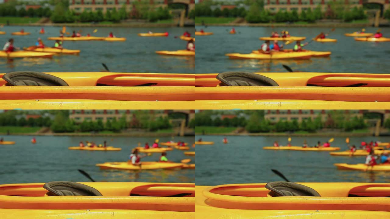 河边的黄色皮划艇-特写背景