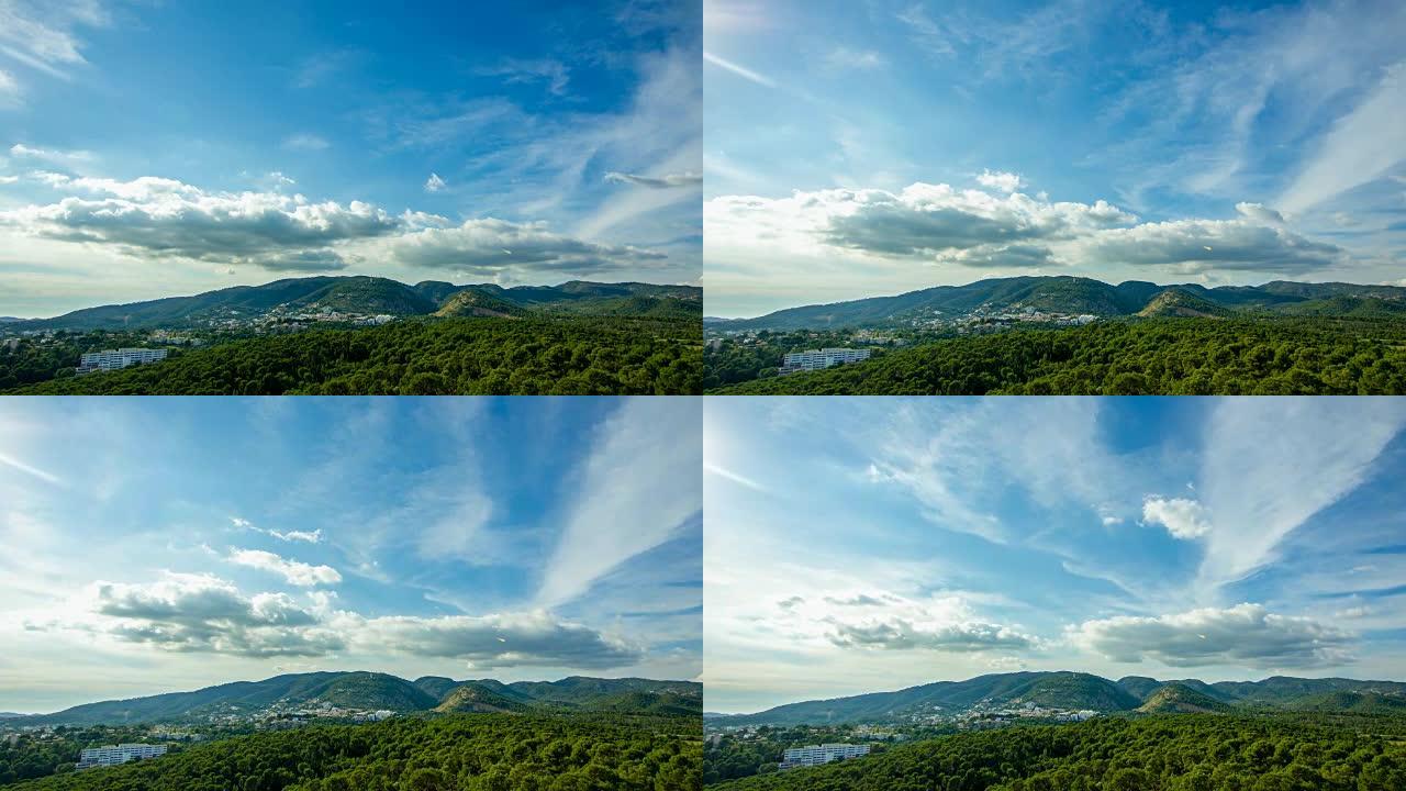 山谷景观，有山林和绿色的林木，蓝天上的云层移动马略卡岛城堡马略卡岛