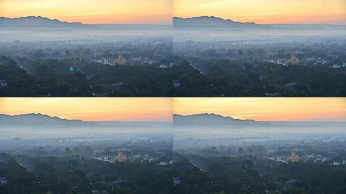 日出在缅甸曼德勒山的群山后面，时间流逝。
