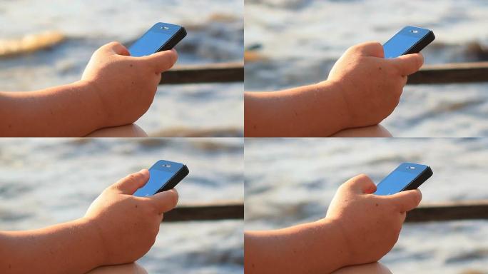 在河附近使用智能手机