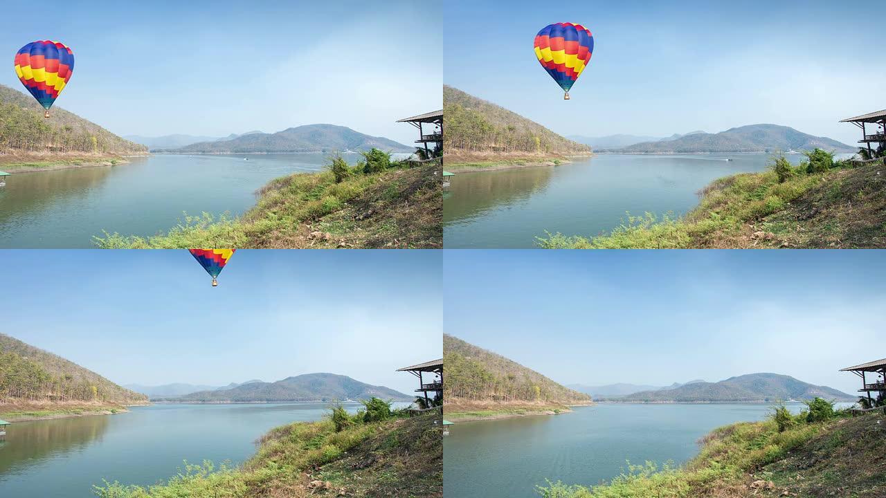 彩色热气球飞越湖面，延时