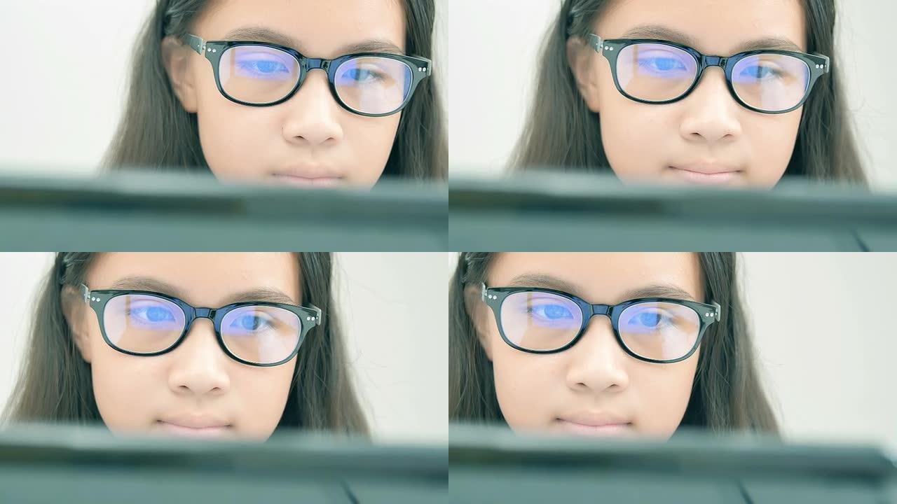 女孩使用笔记本电脑的特写镜头，绿屏