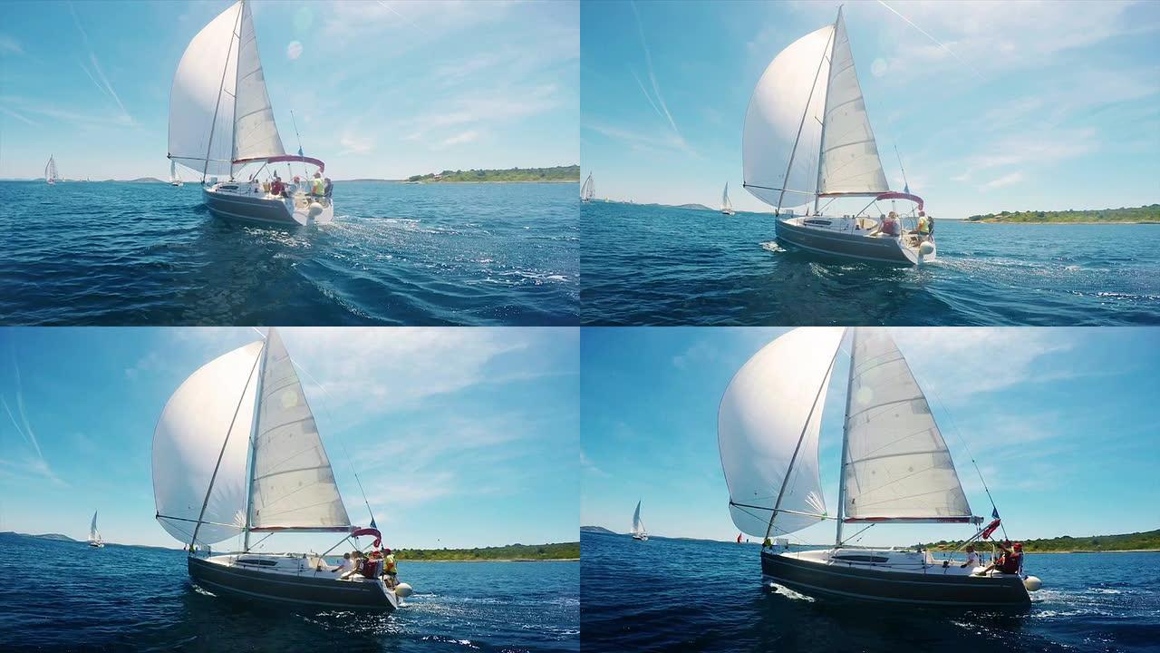 高清手持: 帆船赛上使用主帆和纺纱机的帆船