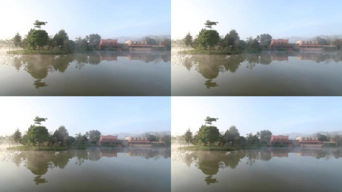 清晨薄雾弥漫。宁静唯美湖水倒影早晨晨雾