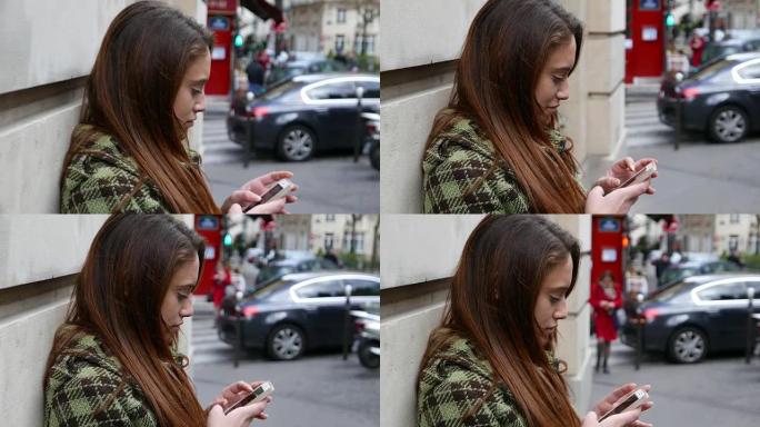 沮丧的女人在街上发短信