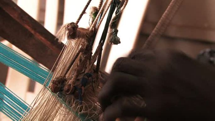 非洲手工织布机上运动中的海德尔
