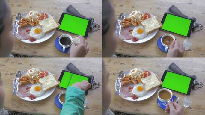 早餐使用绿屏数字平板电脑