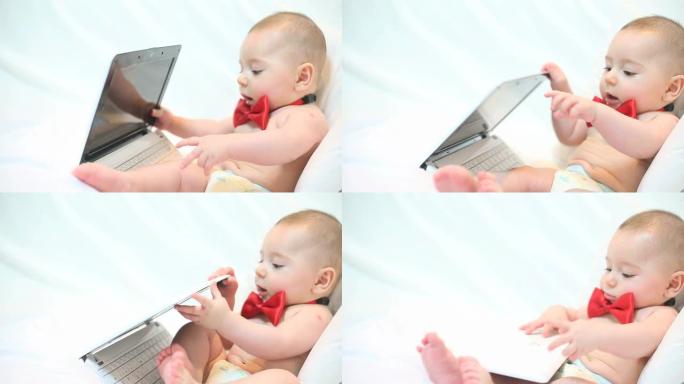 婴儿和笔记本电脑婴儿和笔记本电脑