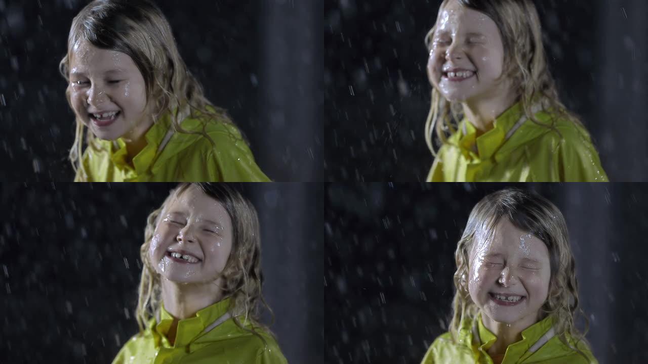 小女孩在雨中玩得开心