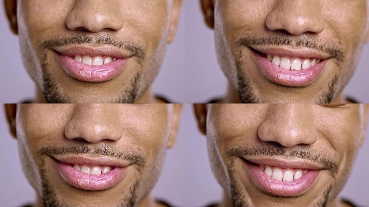 一个年轻的非洲裔美国男性微笑的嘴唇