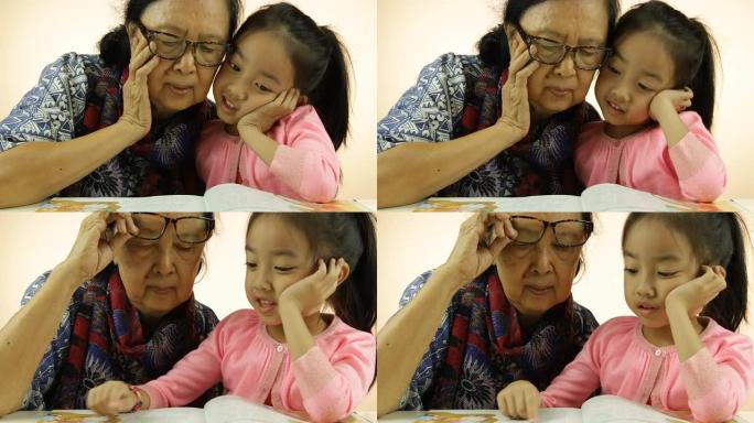 亚洲小女孩和奶奶读书