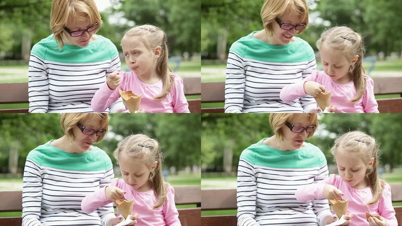 高清1080p母亲和女儿吃冰淇淋