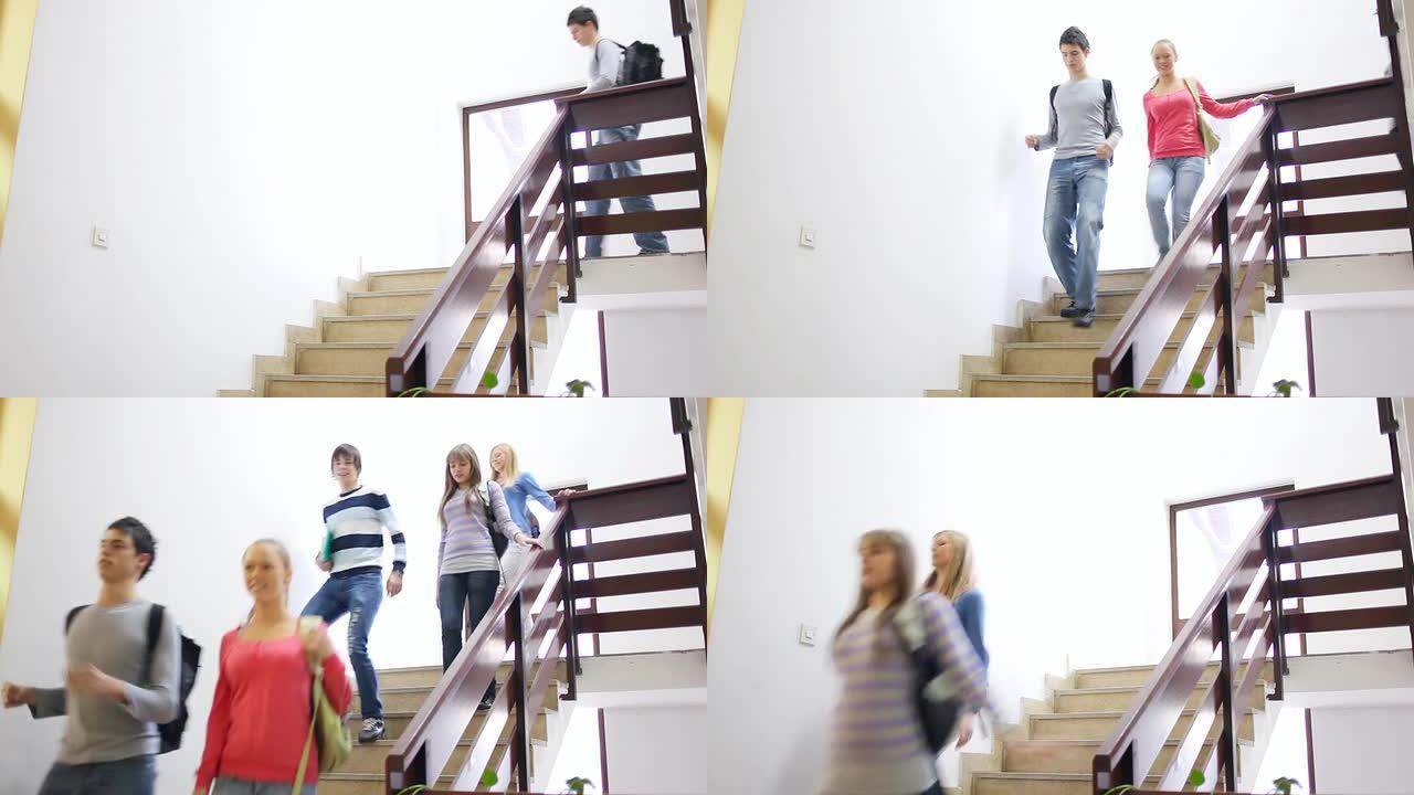 一群学生走下楼梯。