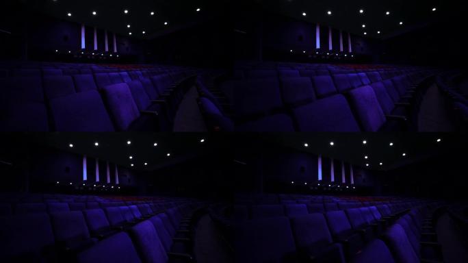 空荡荡的蓝色电影院大厅，有VIP座位