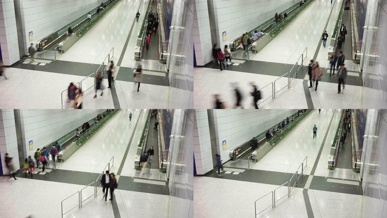 乘客在机场乘坐自动扶梯，时间流逝。