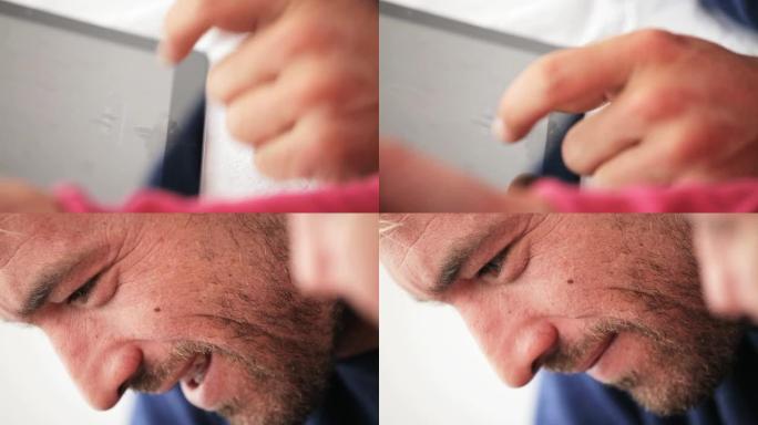 特写男子使用数字平板电脑
