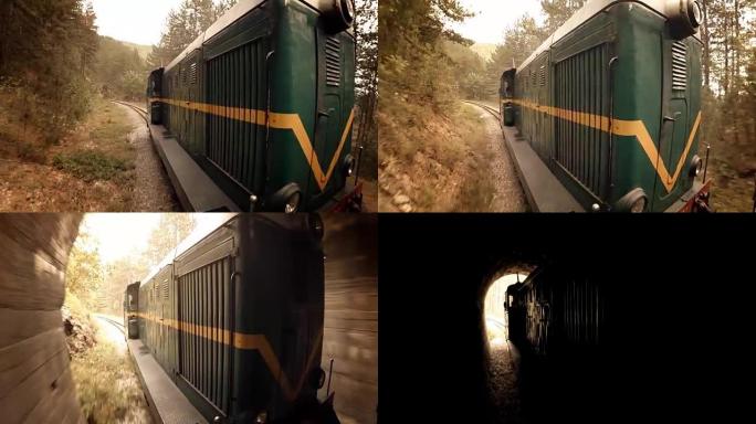 通过隧道和山区景观的火车-窄轨铁路