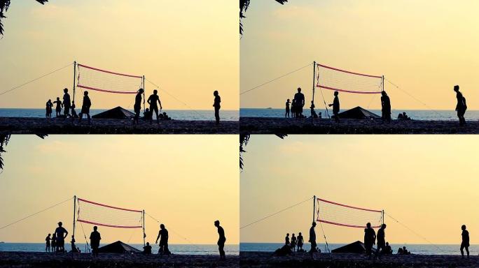 排球剪影在沙滩上打排球