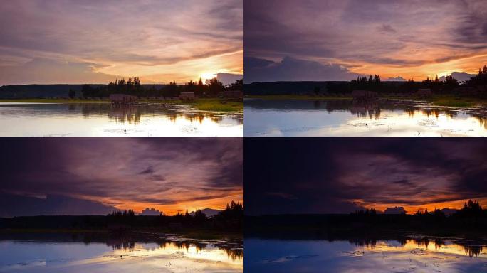 湖边的日落傍晚晚霞火烧云剪影轮廓湖水倒影