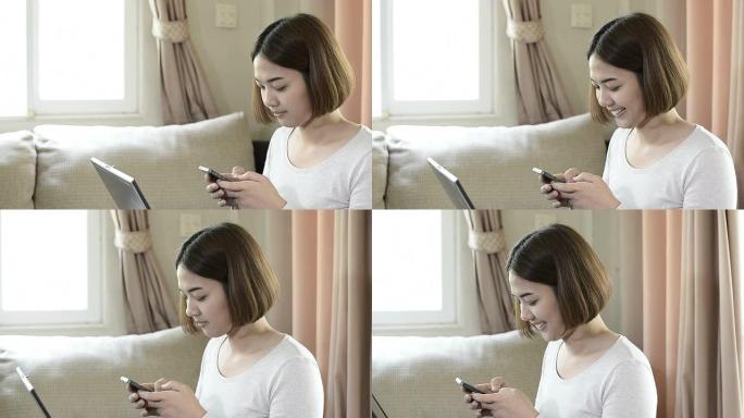 年轻女子在家使用智能手机