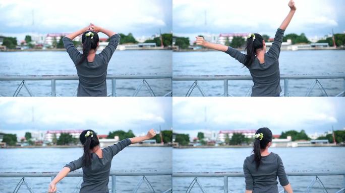 女人在河边放松