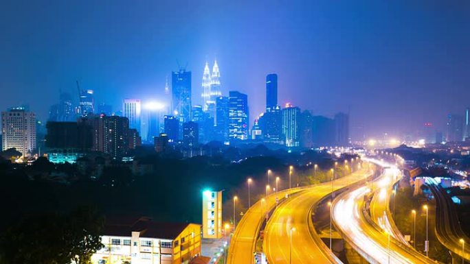 繁忙的交通，现代建筑和城市城市吉隆坡晚上，时间流逝。