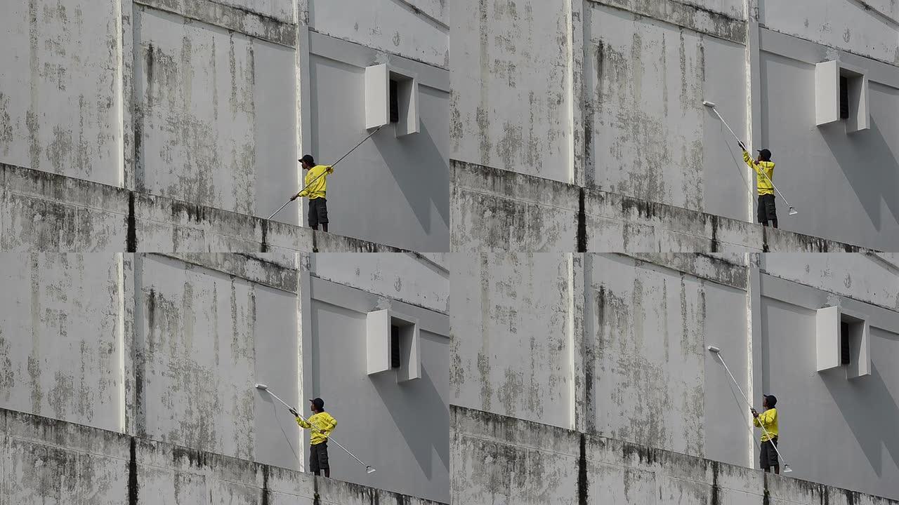 粉刷墙壁房屋室外农民工工人白色墙壁外墙