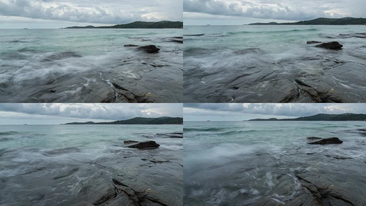 波浪压在岩石上