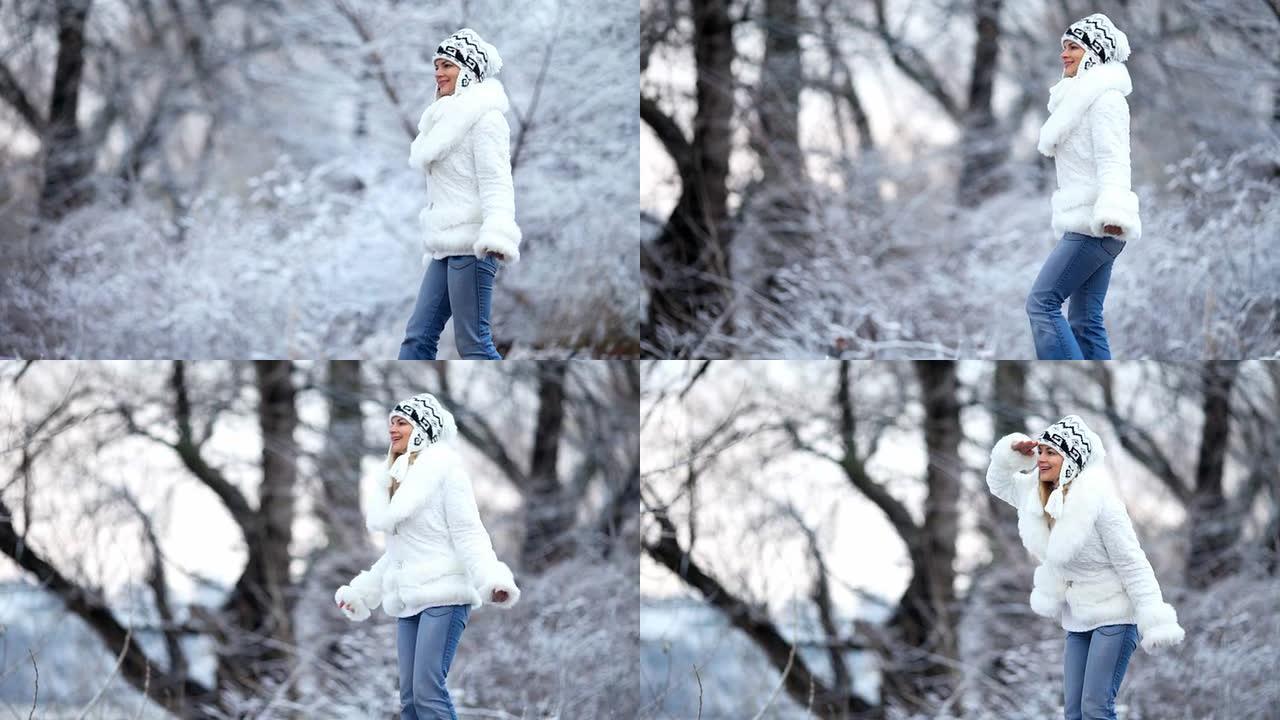 女孩在雪地森林中行走