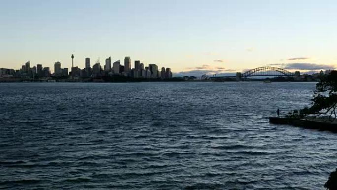 悉尼海港大桥，歌剧院和城市日落4k