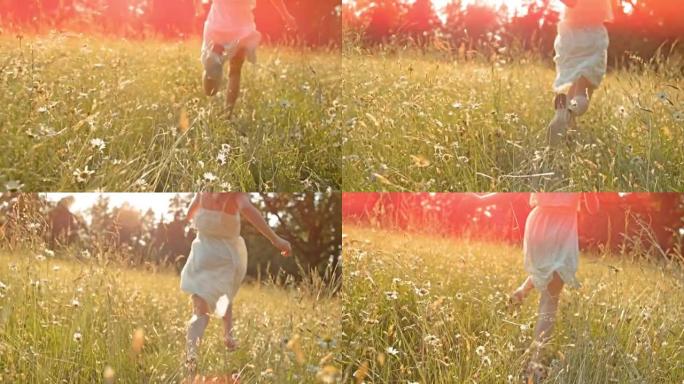 SLO MO TS女孩在阳光下在高高的草地上奔跑