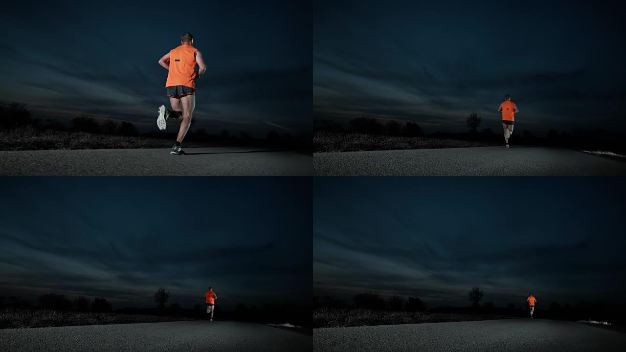 SLO MO DS男运动员在夜间进行马拉松训练
