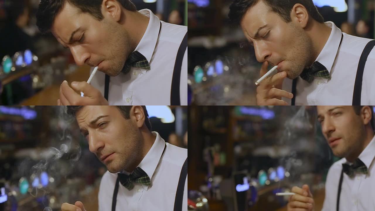 优雅的年轻人在酒吧吸烟
