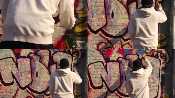 涂鸦艺术家绘制城市墙壁的中广角镜头