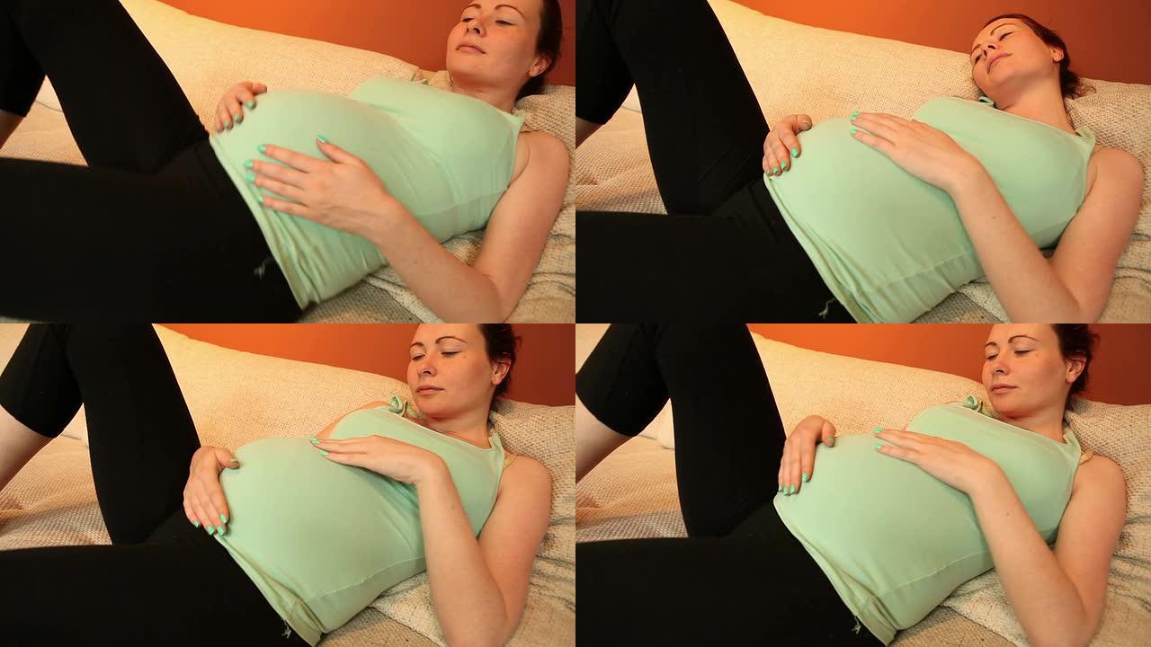 年轻女性怀孕妊娠期抚摸肚皮准妈妈