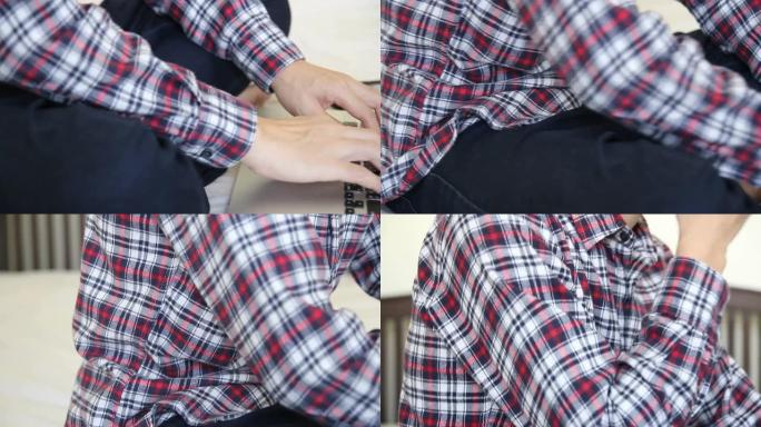 高清: 男人因使用笔记本电脑而感到疲倦