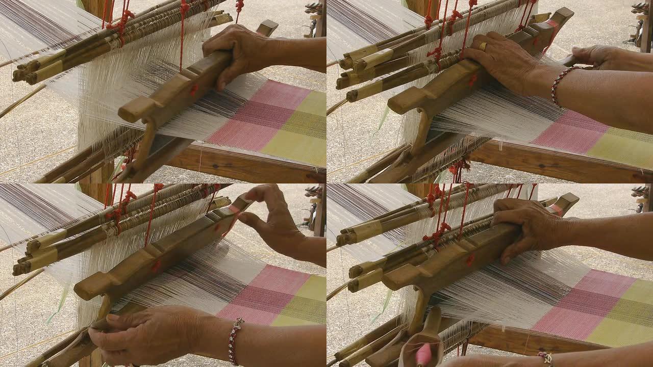 用织机织造传承文化灵巧的手手工编织