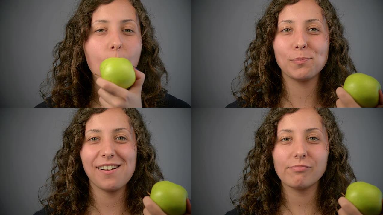年轻女子吃青苹果