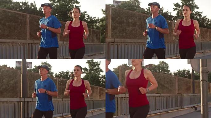 SLO MO TS夫妇穿过街道立交桥