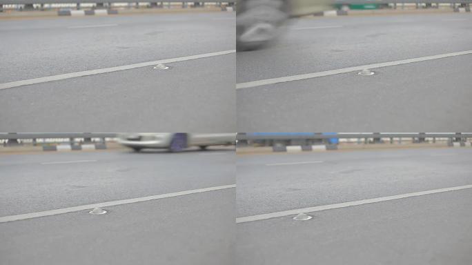 高清多莉: 有汽车交通的地面道路。