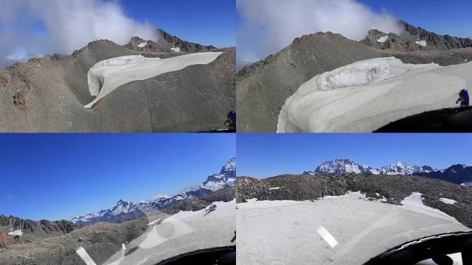 直升机降落在靠近山的冰川上。新西兰库克